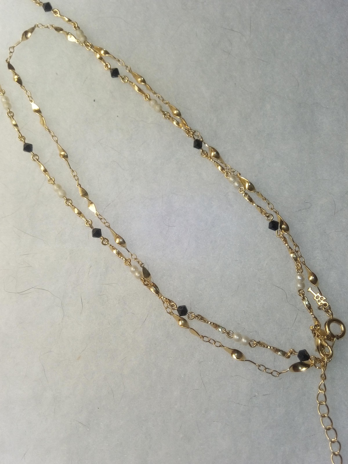 2 necklaces Complement Ea. Other, GTone, 1 with Small Whi Beads & Plastic Oval