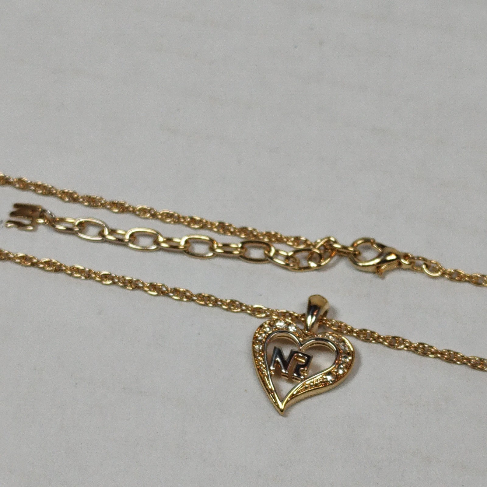 Gold Tone Metal Clear Colorless Stones Heart Pendant Necklace 14.75″ – 16.75″