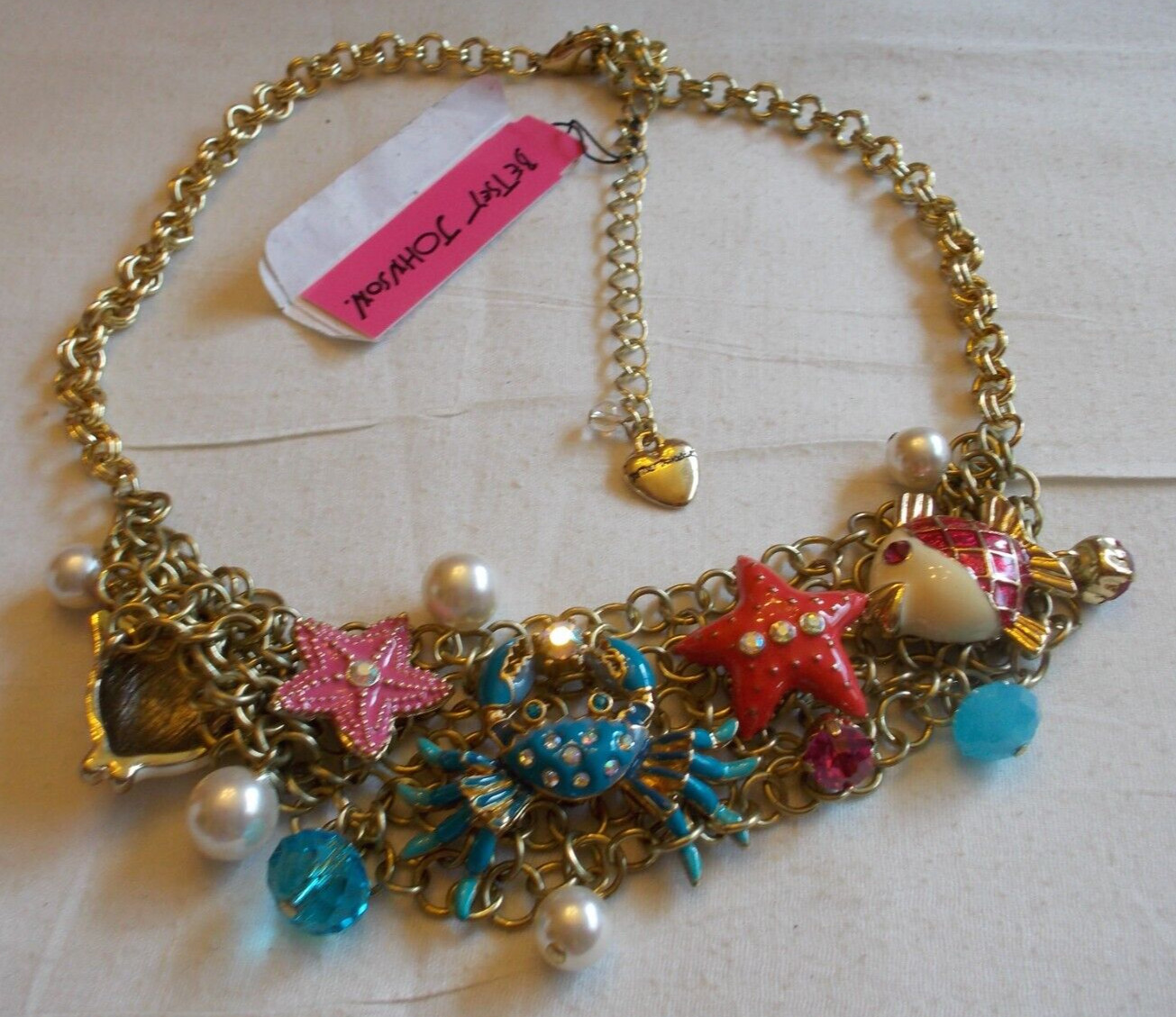 BETSEY JOHNSON LOVELY SEA LIFE CRYSTAL AND ENAMEL MULTICHARM STATEMENT NECKLACE