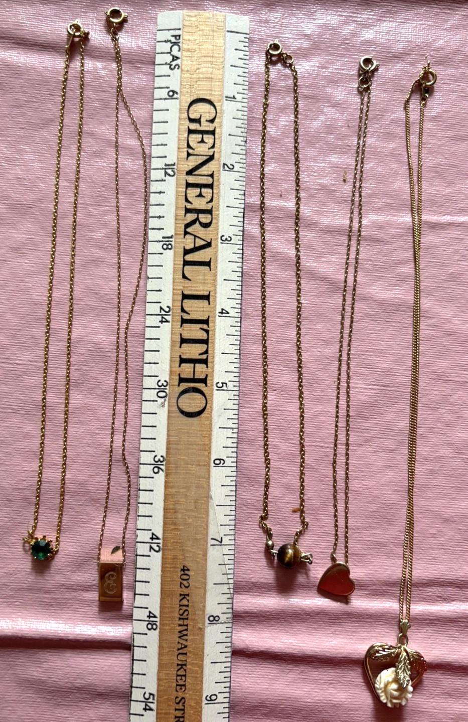 Five gold colored Necklaces, length – varies 14 – 16″