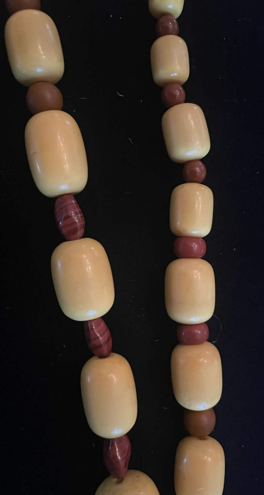 Yellow and Brown Beaded Necklace with Carved Wooden Pendant. 30 in. Gift box