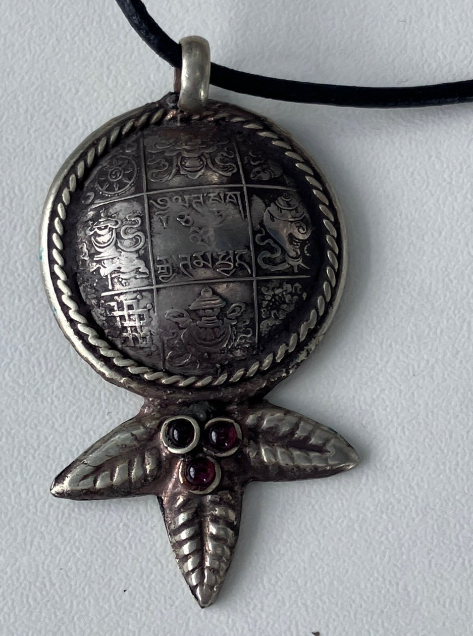 Vintage 1990s Nepal Tibet marijuana leaf coin pendant