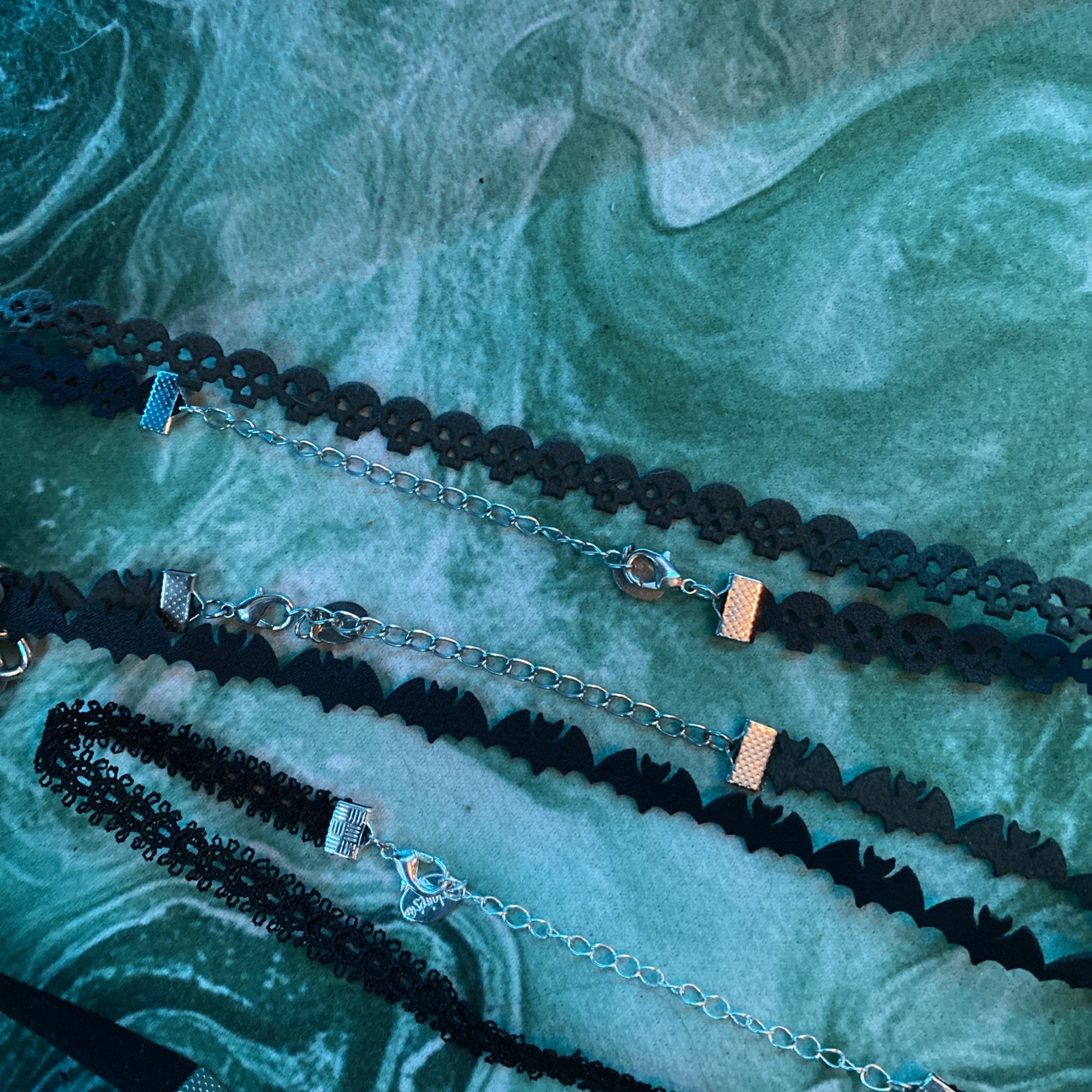 8 Chokers (4 lace-like, 2 string with pendants, 2 chains)