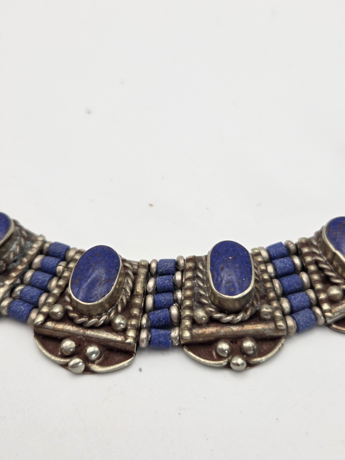 Tibetan-style handcrafted necklace from Nepal features vibrant lapis lazuli