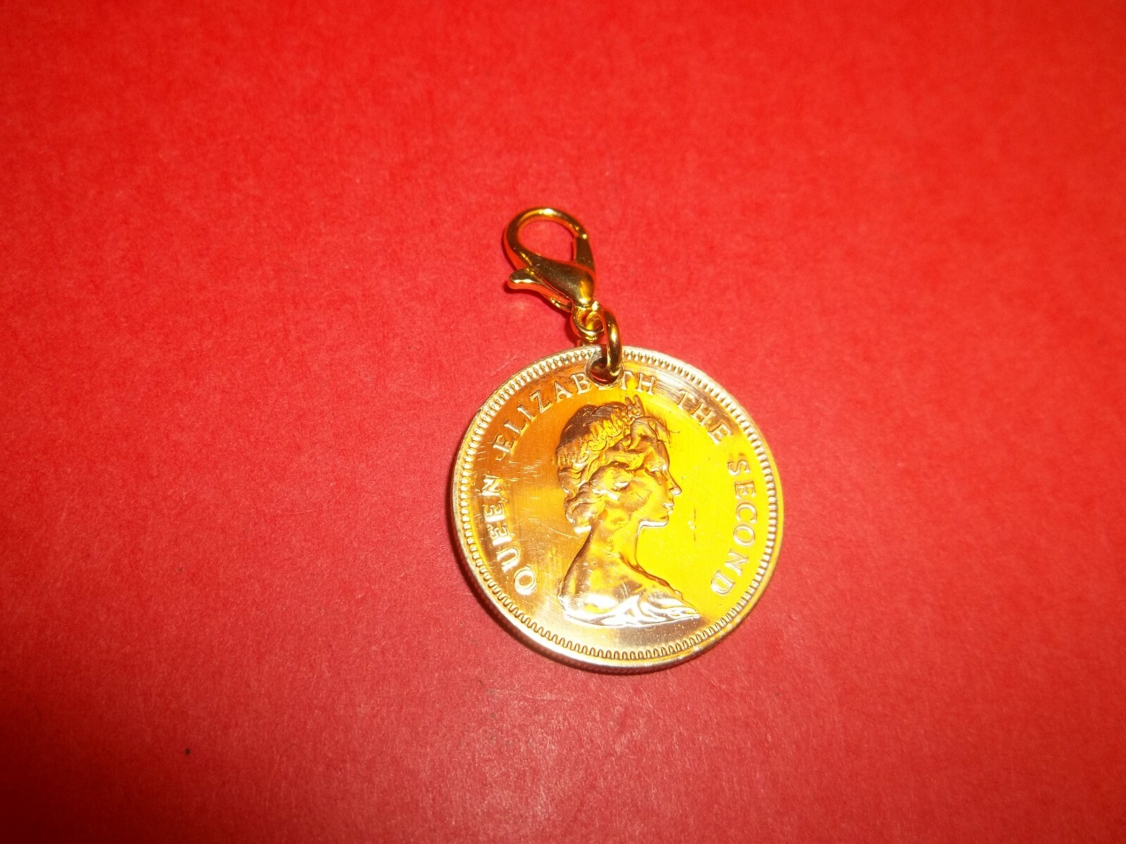FIFTY (50) CENTS – HONG KONG – HIGHLY POLISHED PENDANT / CHARM – 1977 to 1998