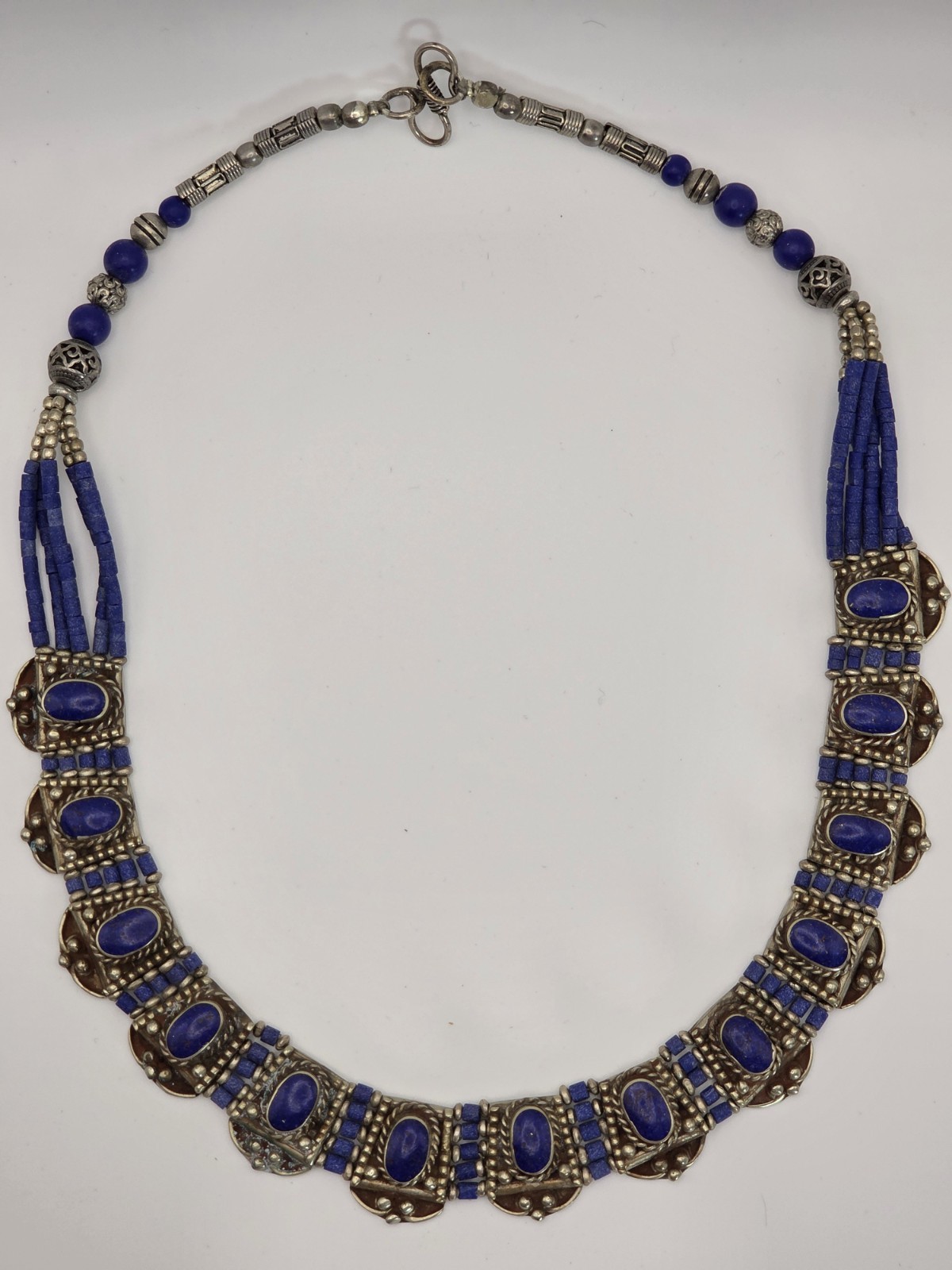 Tibetan-style handcrafted necklace from Nepal features vibrant lapis lazuli