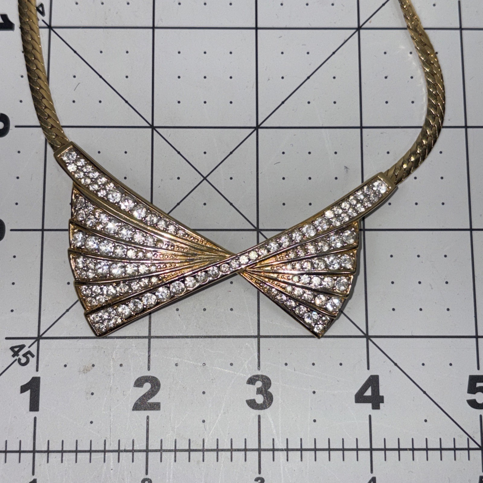 Beautiful Nina Ricci Pave Set Rhinestone Bow Tie Necklace in Goldtone