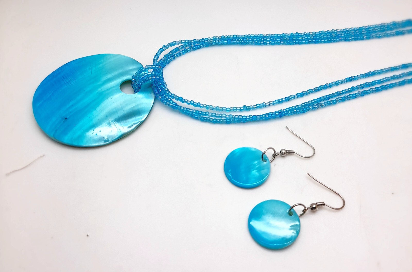 S001 Round shell Pendant blue strand seed bead fashion necklace earrings set