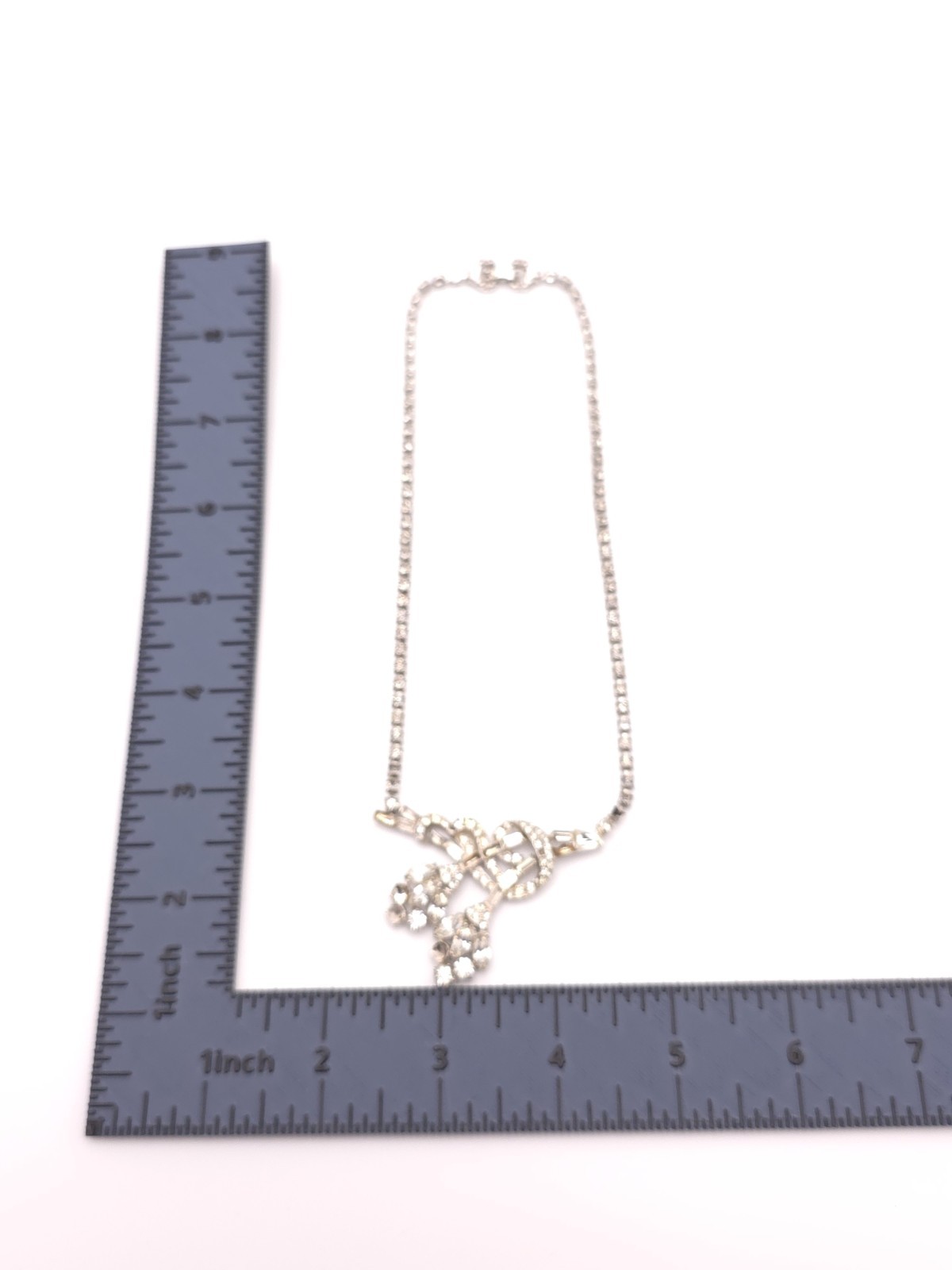 Vintage Silver Tone Rhinestone Bow Pendant Tennis Chain Necklace (Missing Stone)