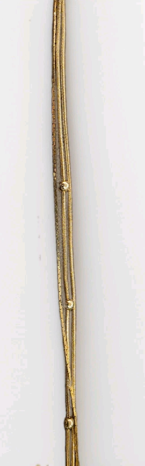 lot of gold tone anklet and 2 vintage Bolo ties, one flower and one heart