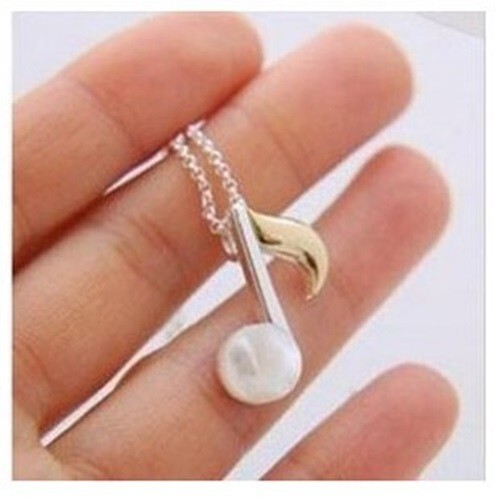 Cute white and gold coloured musical note necklace