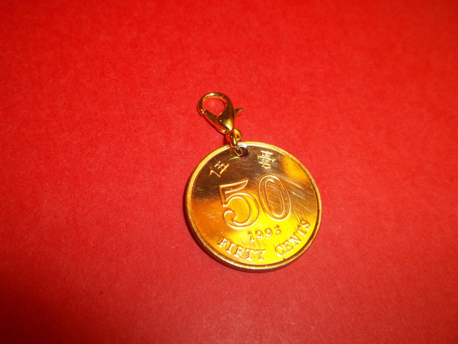 FIFTY (50) CENTS – HONG KONG – HIGHLY POLISHED PENDANT / CHARM – 1977 to 1998