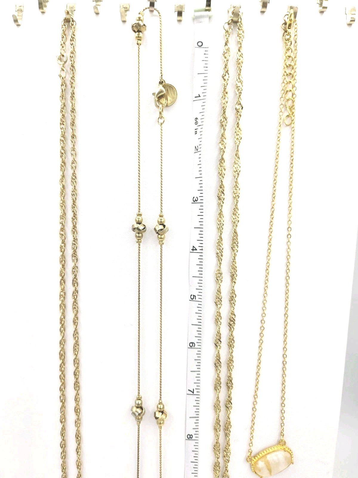 Lot 4 Necklaces W Pendants & Accents Goldtone 18- 32″ Lengths & AKI. 0313