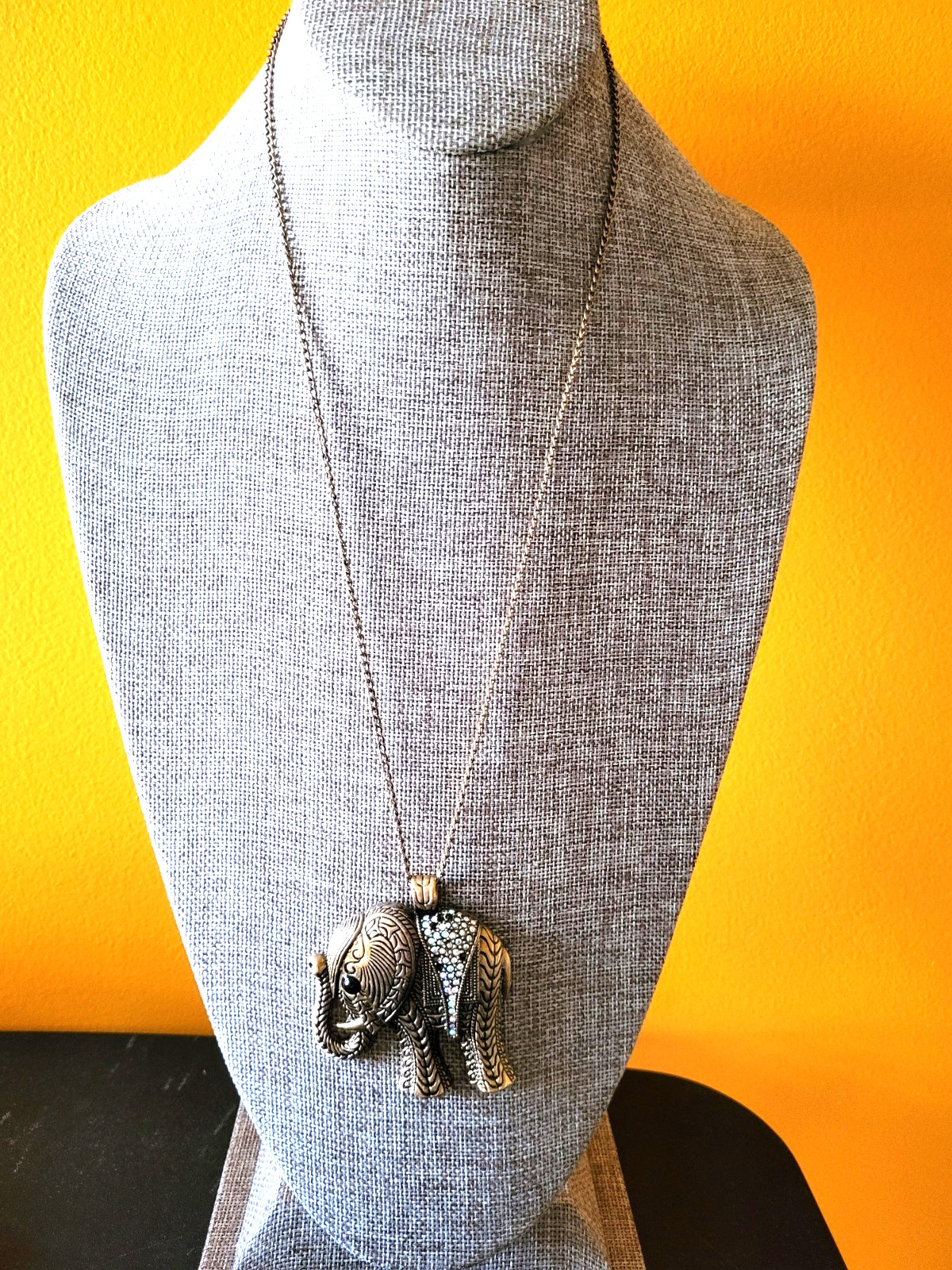Elephant pendant necklace intricate patterns brass-tone metal finish