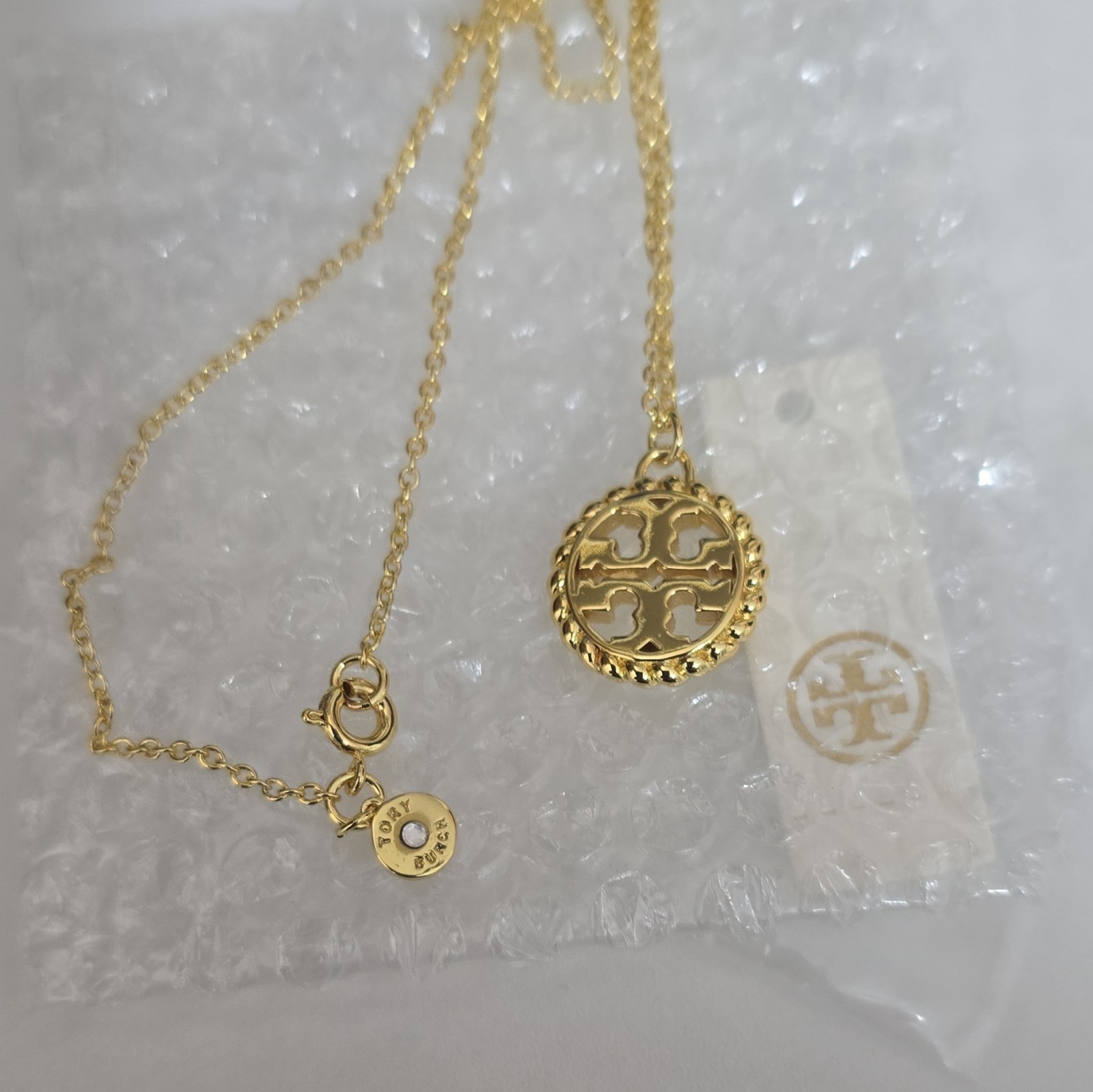Tory Burch Gold Tone Round Logo Charm Pendant Necklace Cable Chain Spring Ring