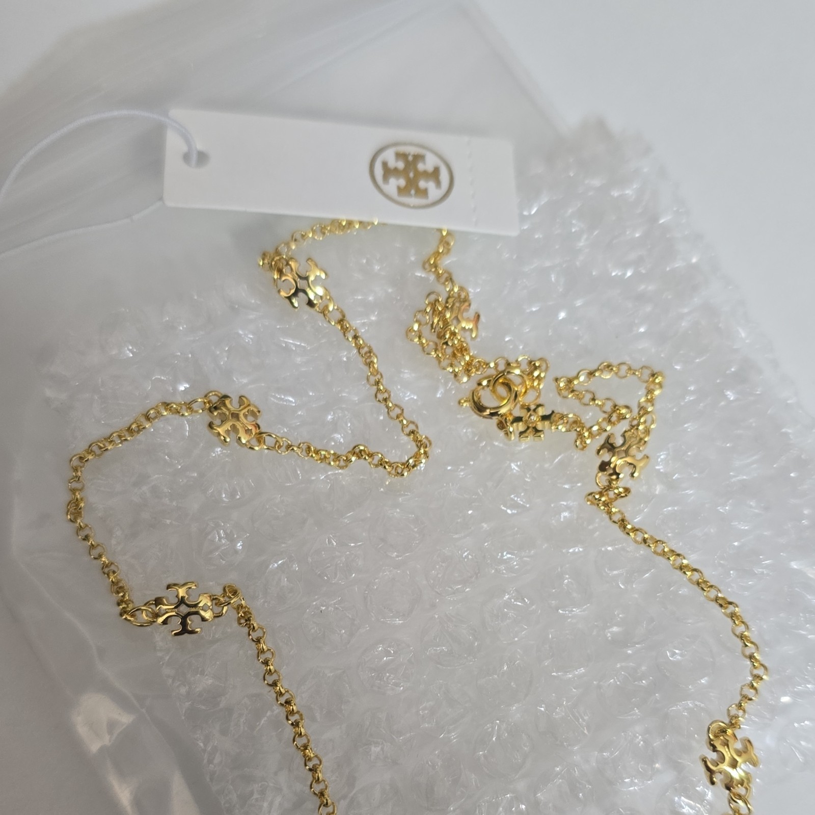 Tory Burch Gold Tone Logo Station Necklace Cable Chain Spring Ring Closure