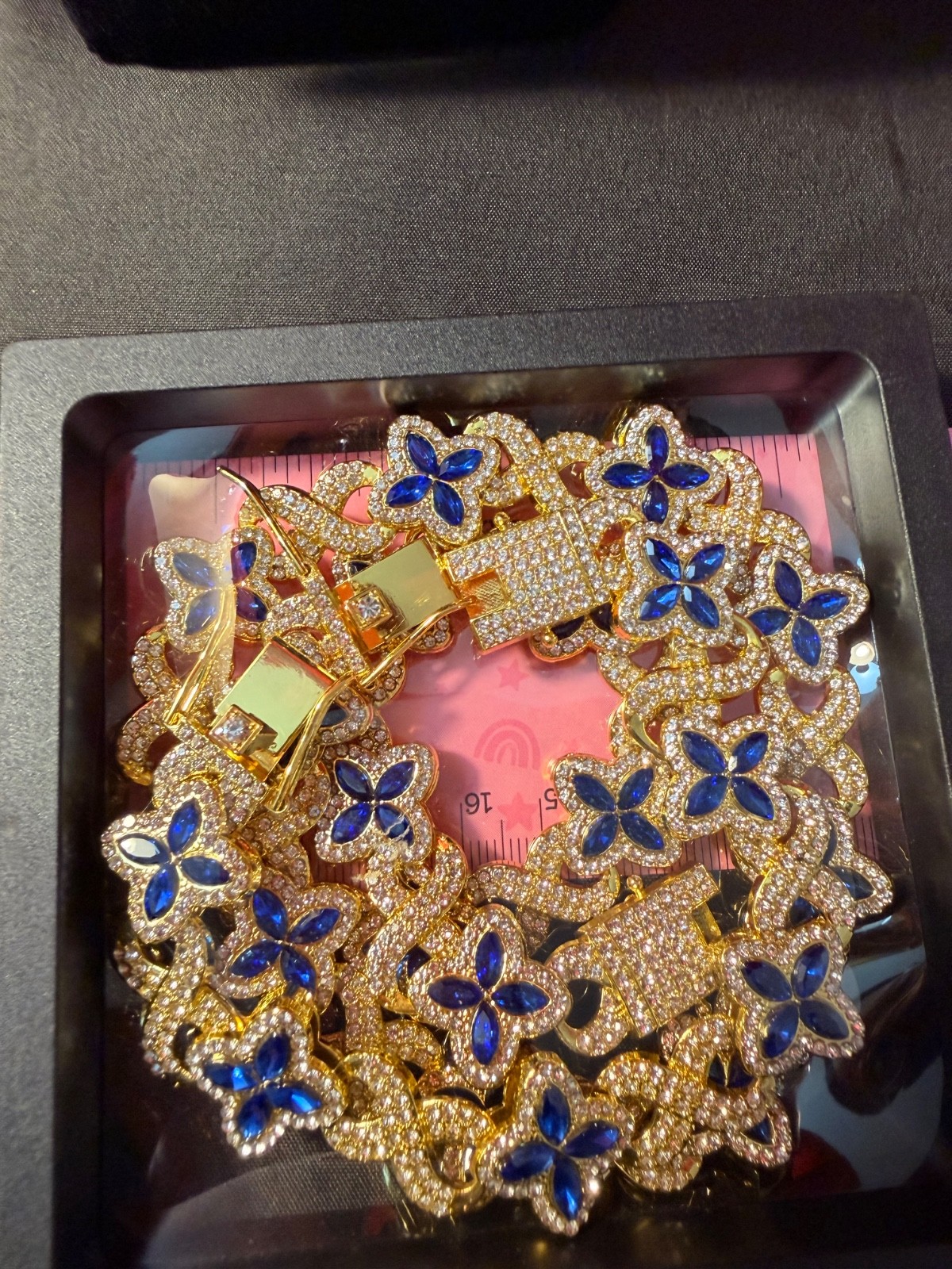 CZ Clover chain and bracelet yellow gold plated blue and white gem stones
