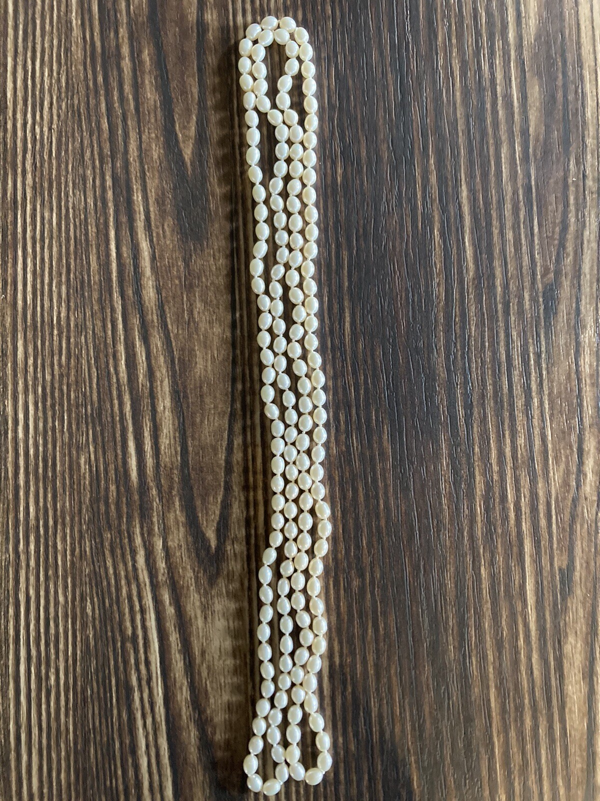 29IN ROPED CULTURED OVAL PEARL NECKLACE 6.5MM