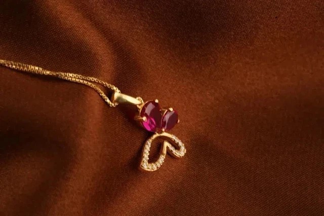 Pear Cut Simulated Pink Ruby Butterfly Shape Pendant In 14k Yellow Gold Plated