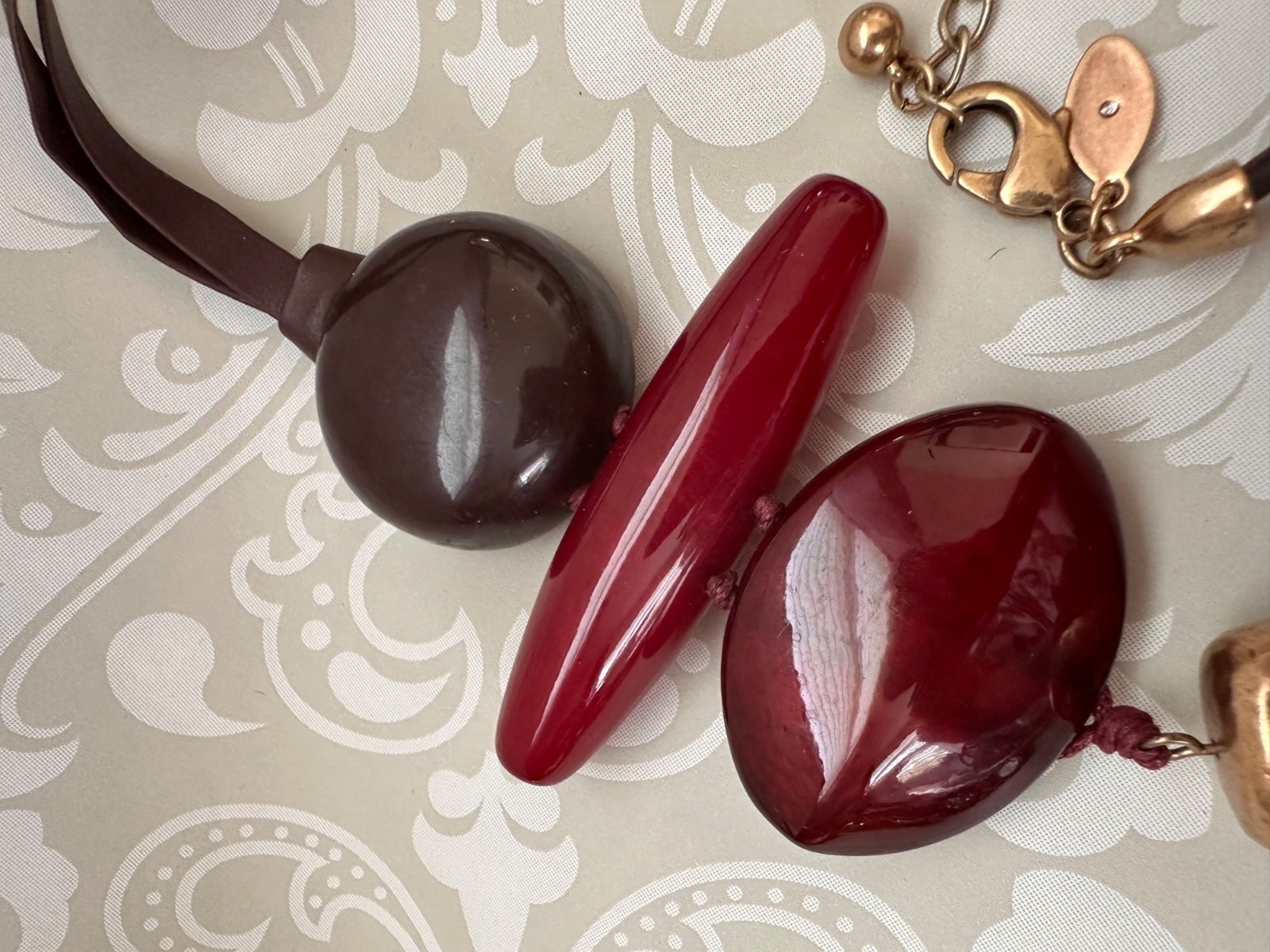 Chicos Pendant Necklace With Burgundy Beads & Faux Leather Tassel