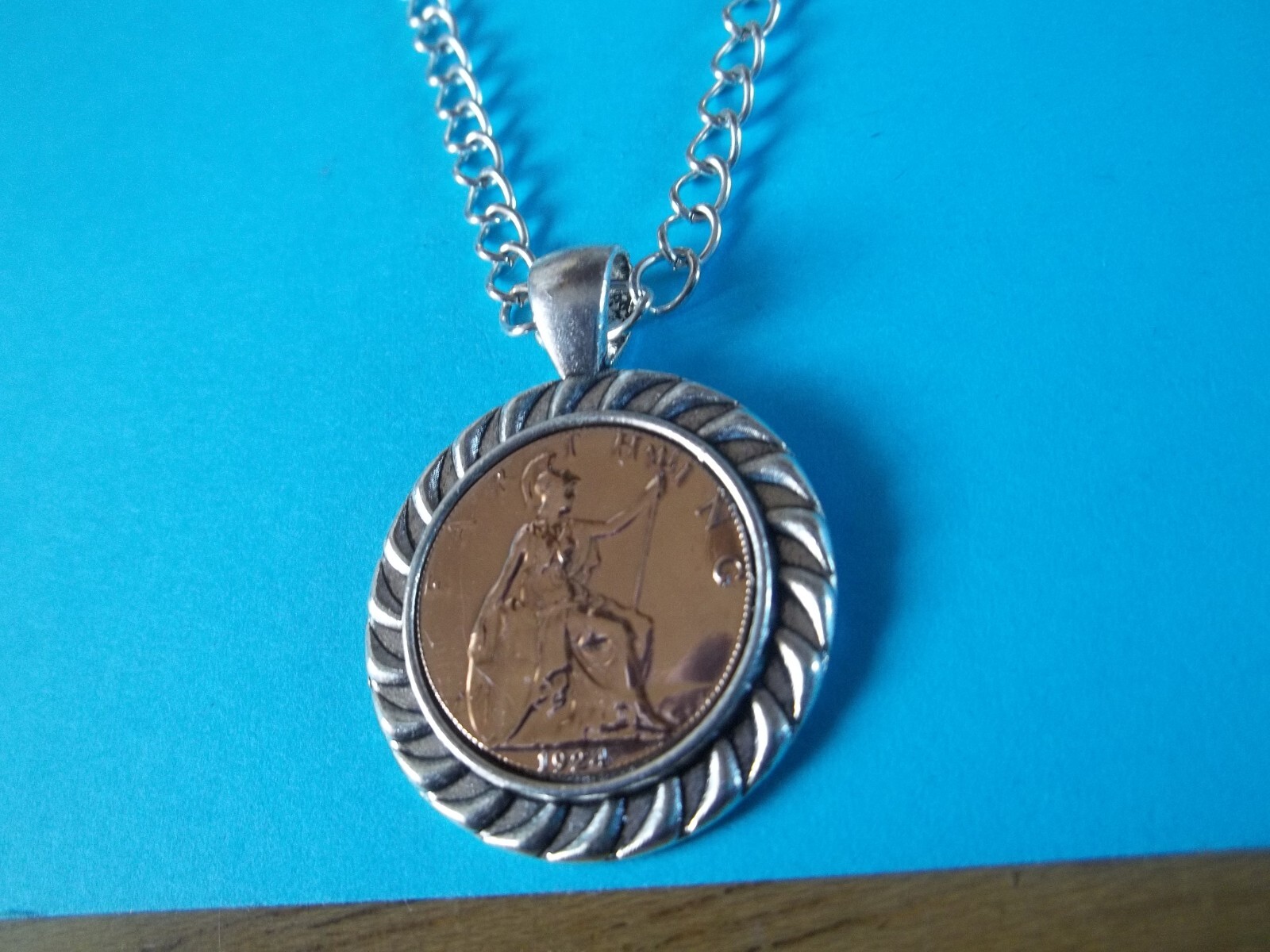 BRITANNIA FARTHING – LIMITED EDITION – SILVER CASED CURB NECKLACE – 1911 to 1936