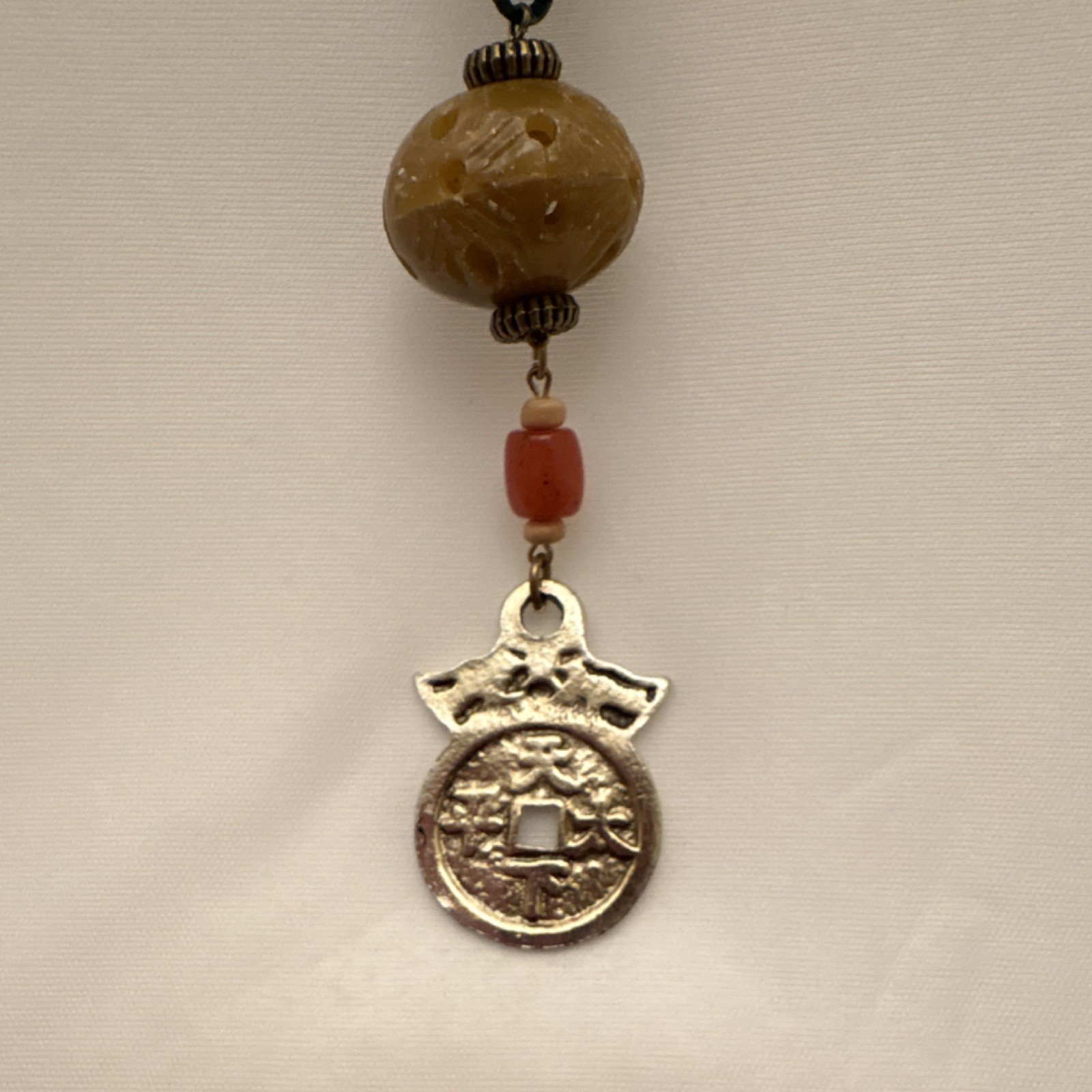 Vtg Multicolor Wood, Metal & Carved Bead Cord Necklace with Asian Charm Pendant