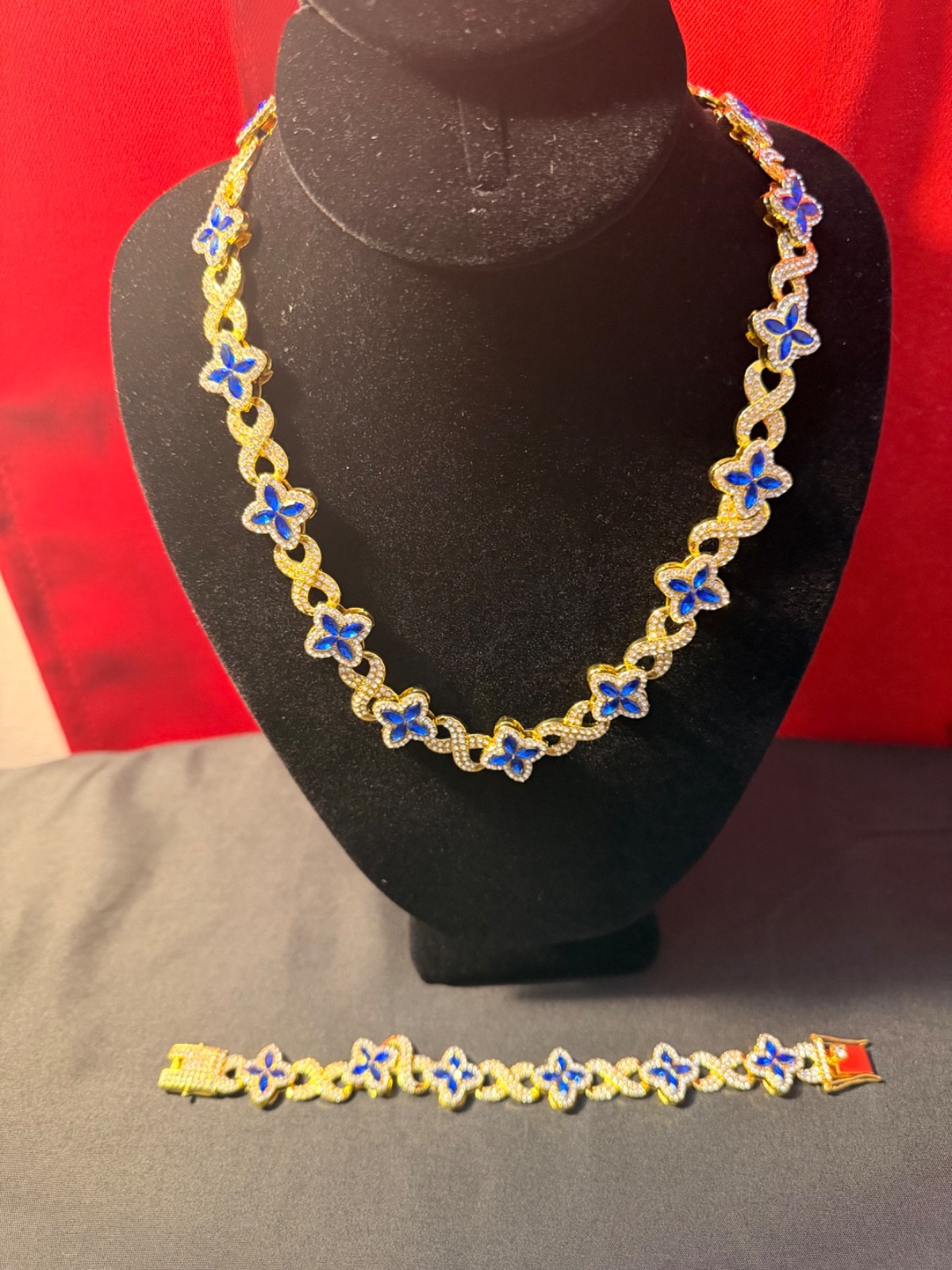 CZ Clover chain and bracelet yellow gold plated blue and white gem stones