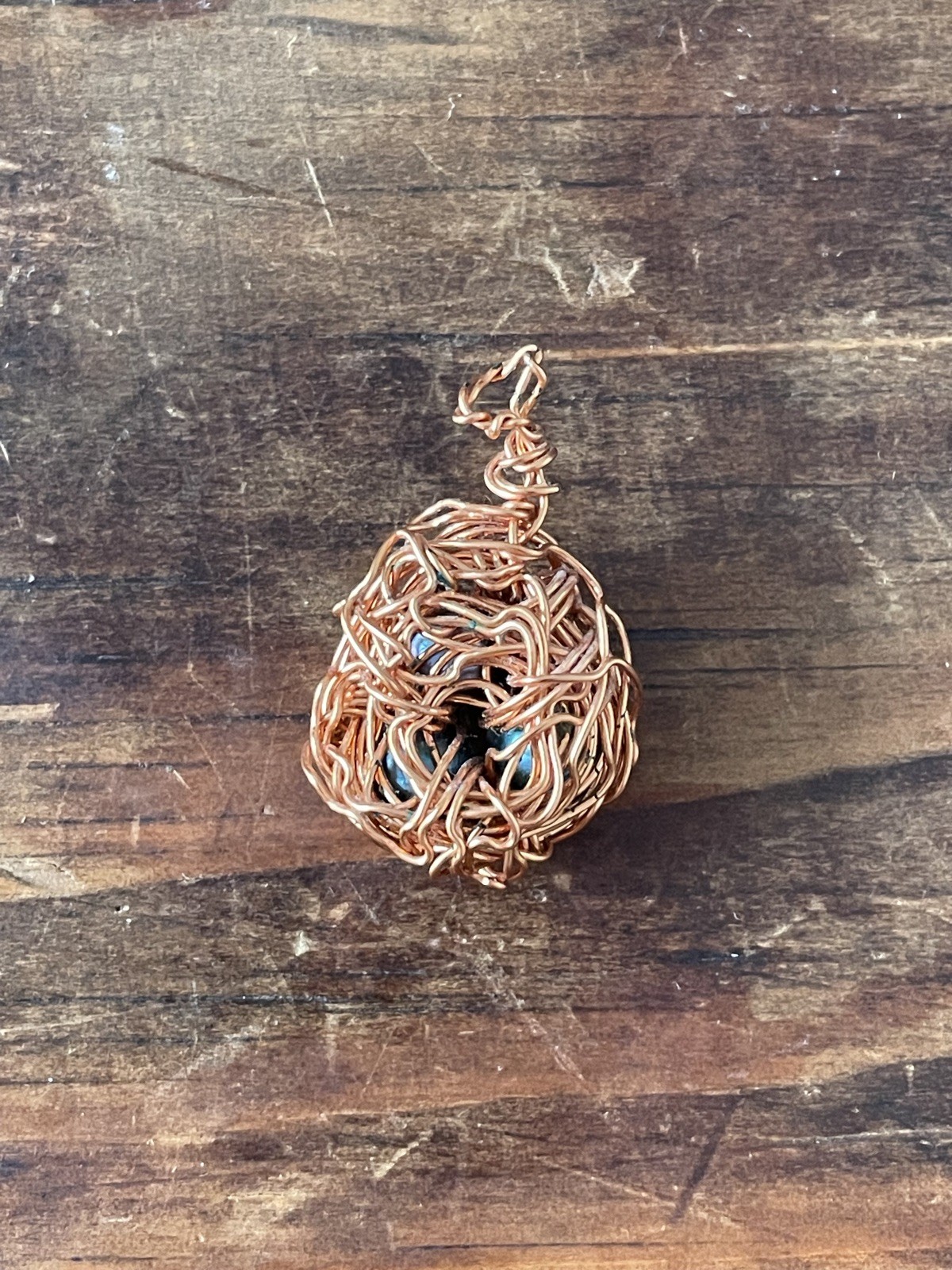 Hand crafted Copper Wire Bird’s Nest Pendant with Blue Pearls
