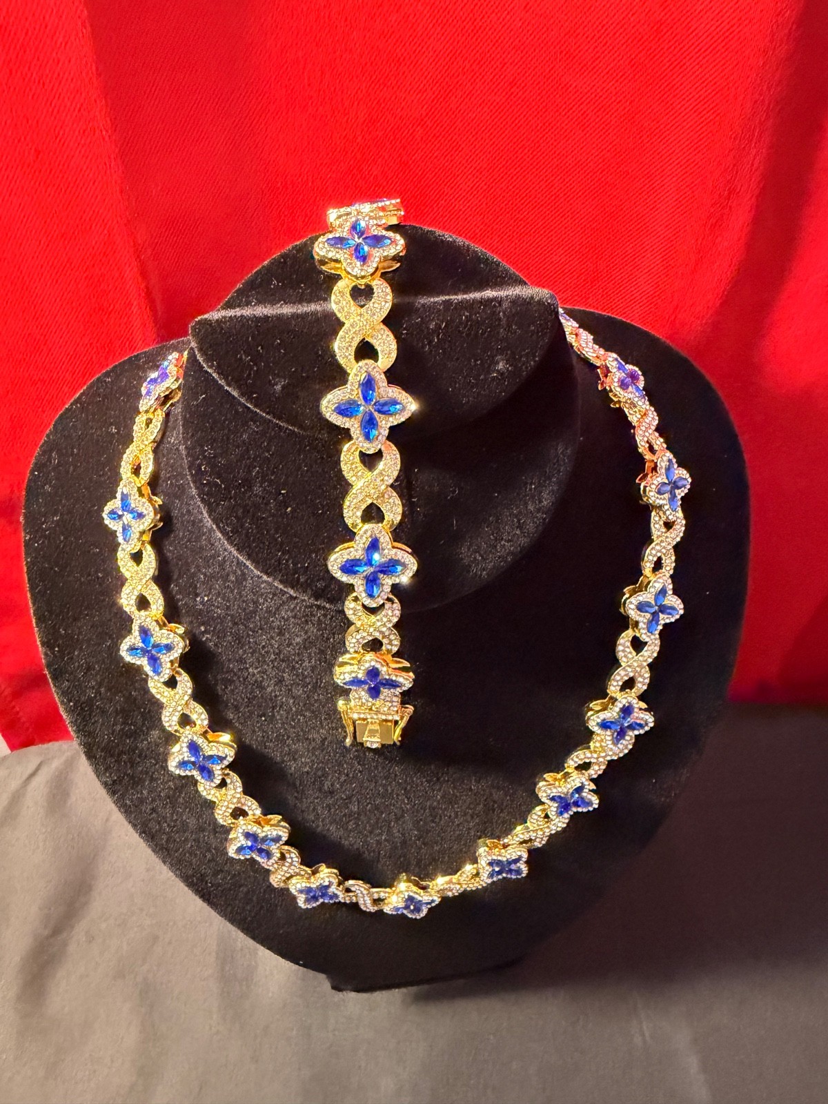 CZ Clover chain and bracelet yellow gold plated blue and white gem stones