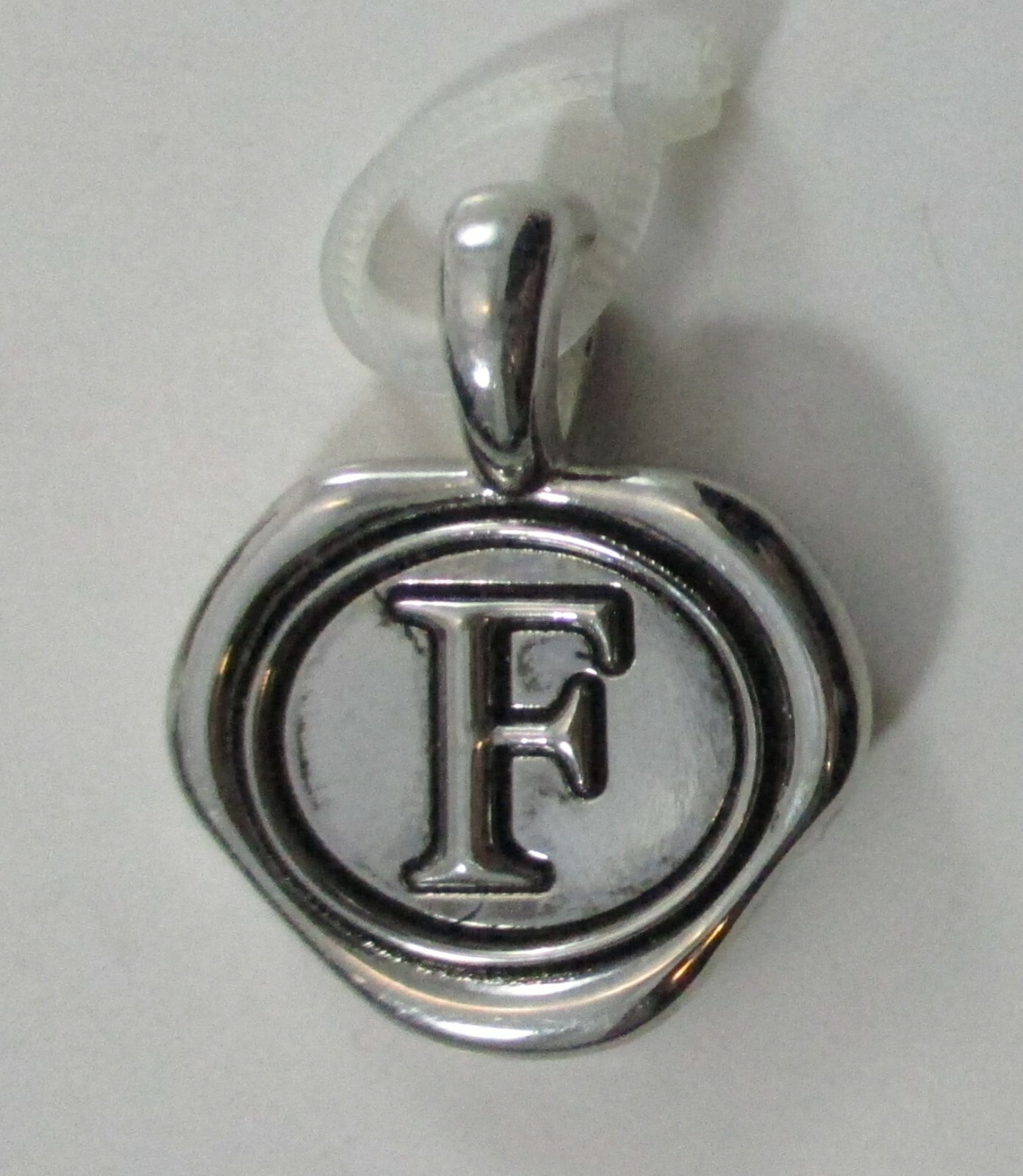 Initial F wax stamp CHARM PENDANT ganz