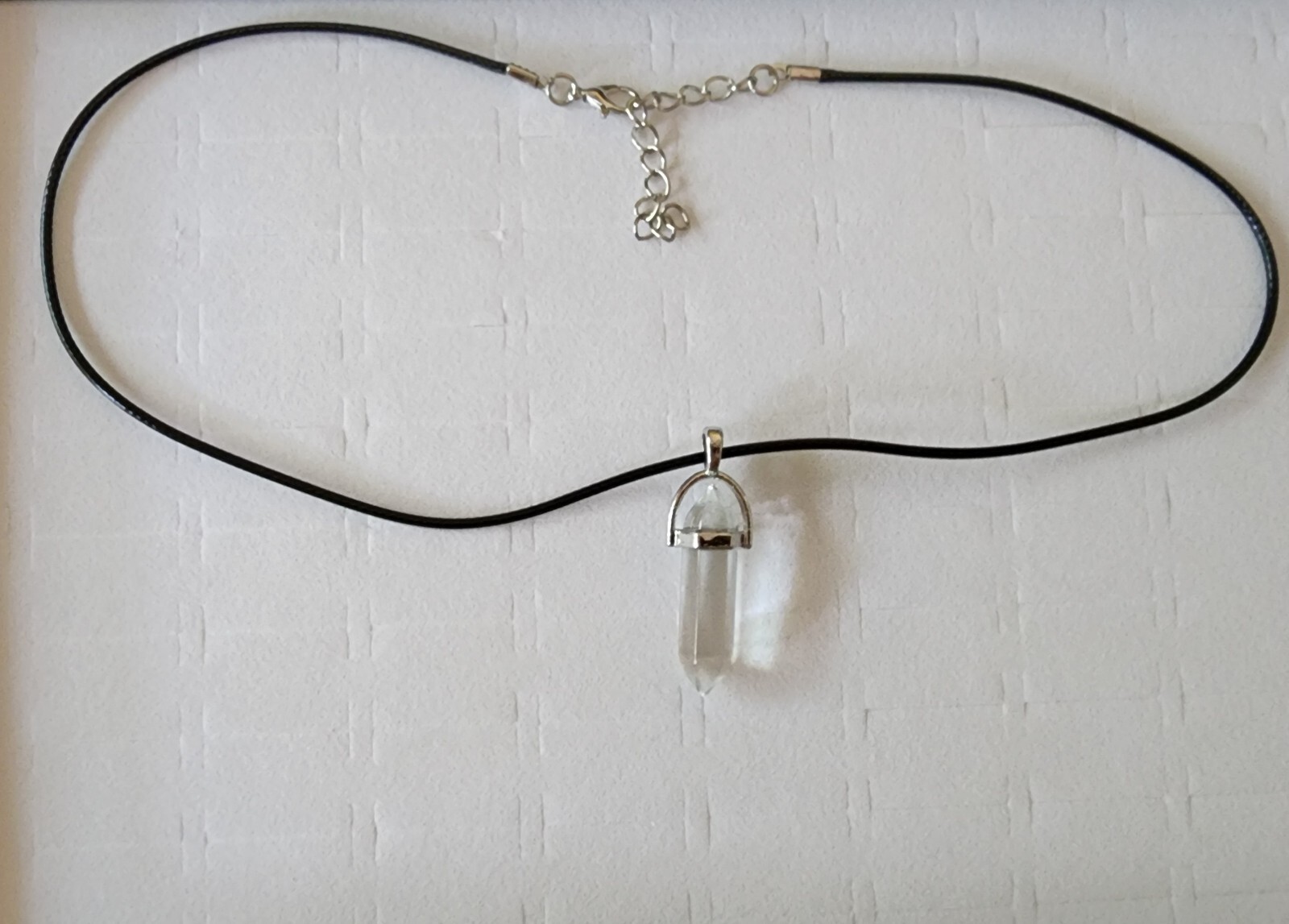 Crystal Healing Stone with black cord necklace Colorless