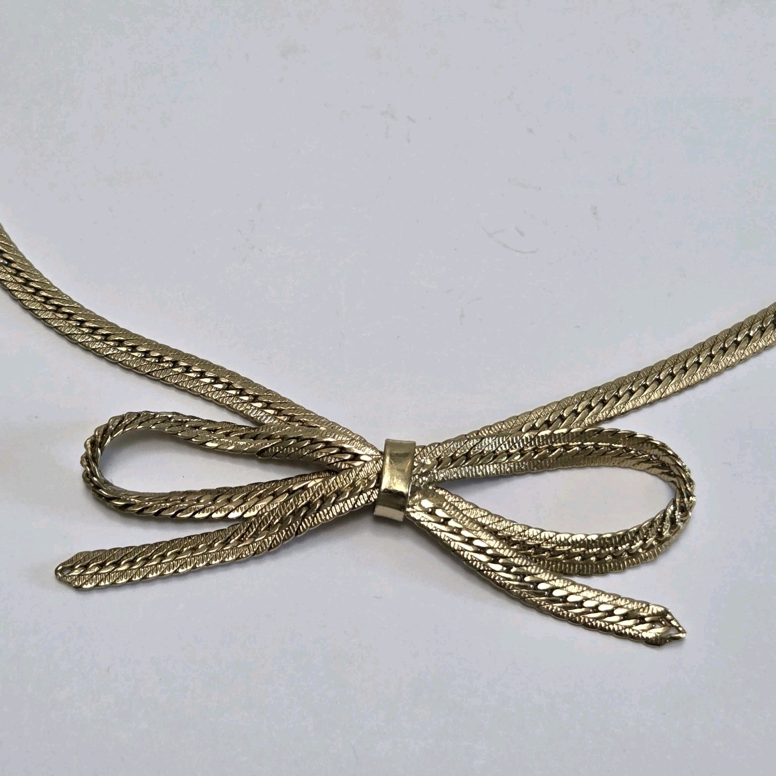 Gold Tone Bow Tie Chain Necklace 16″ – 19″