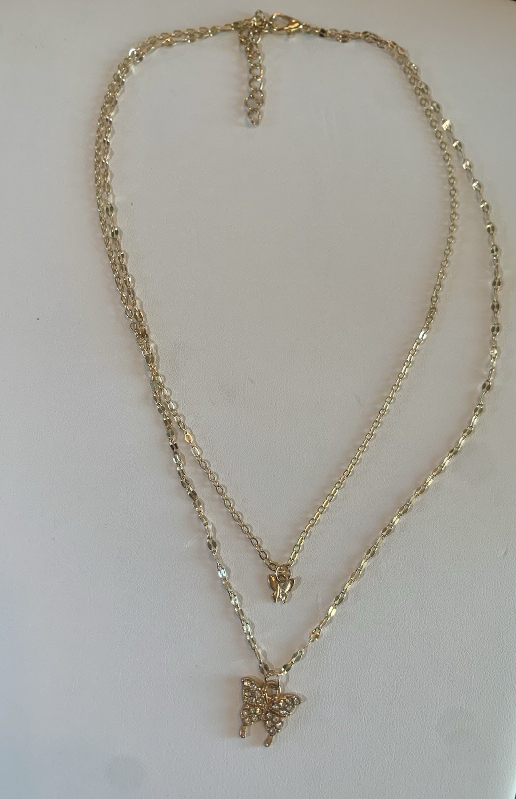 Gold Tone Layered Butterfly Charm Necklace with Clear Crystal Pendant, 16.14″