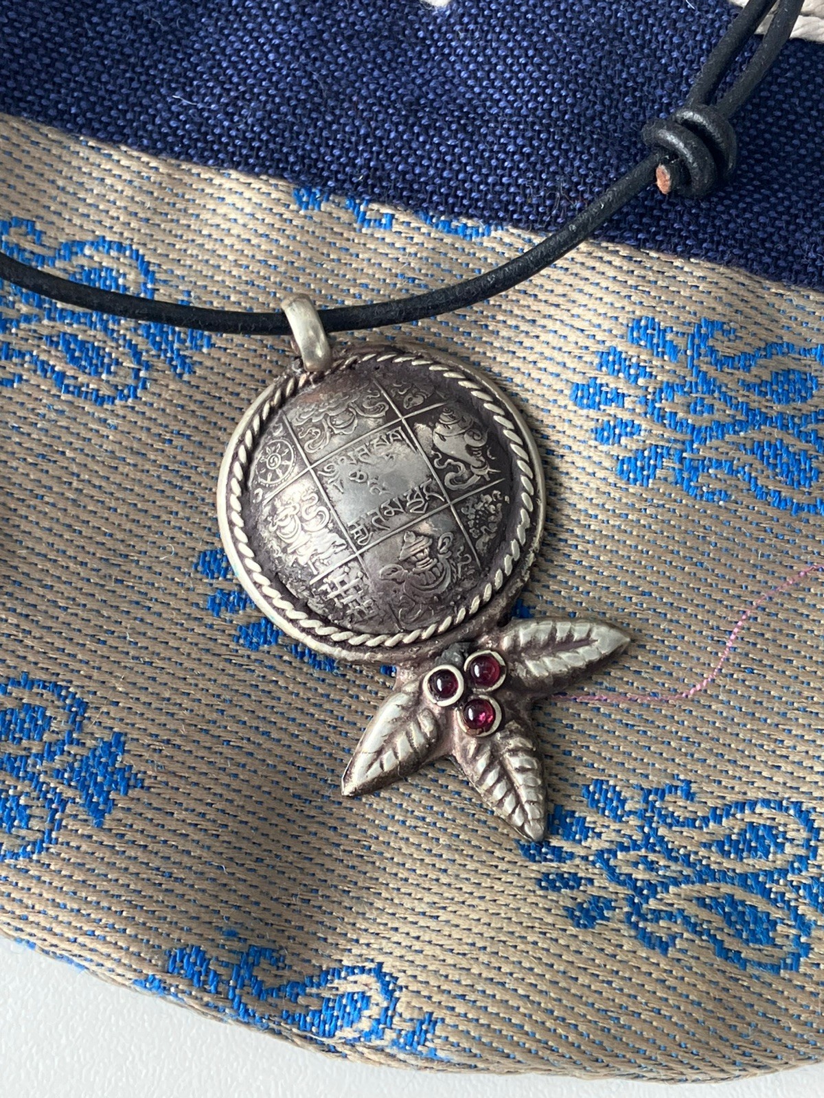 Vintage 1990s Nepal Tibet marijuana leaf coin pendant