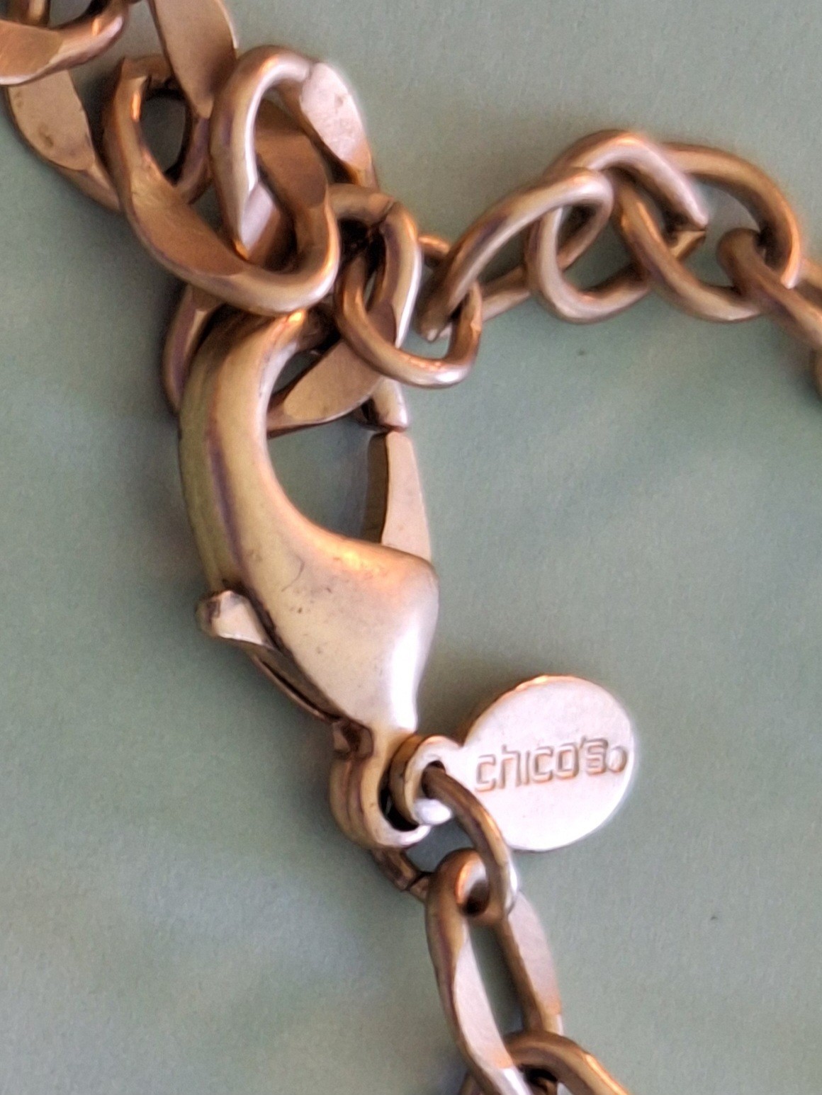 CHICO’S 18 INCH LONG GOLD COLORED BALLS AND COLORLESS STONE STATEMENT NECKLACE