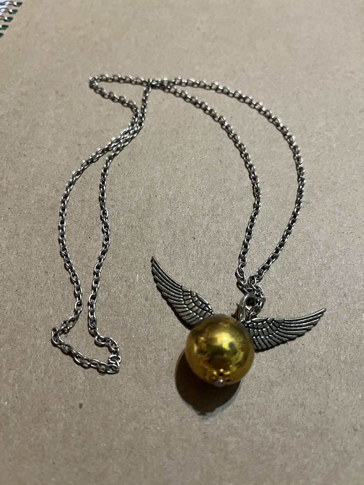 Harry Potter Guardian golden snitch w/ gold tone sphere