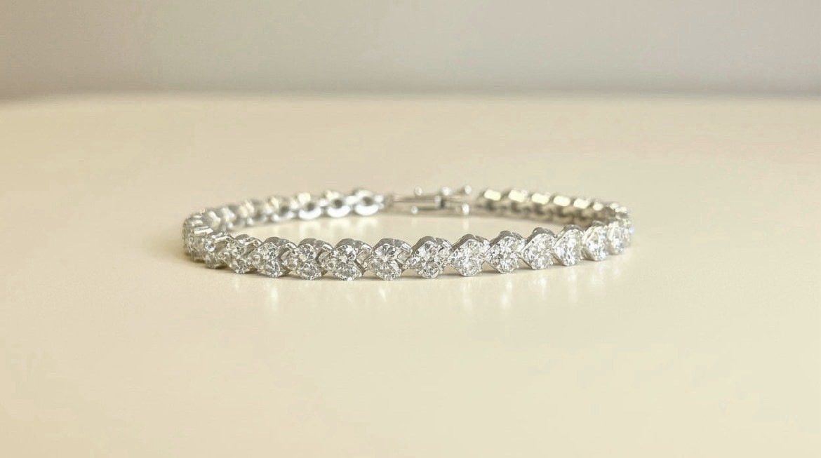 ORENTINI 18K White Gold Plated 7.5in Tripple Tennis Bracelet