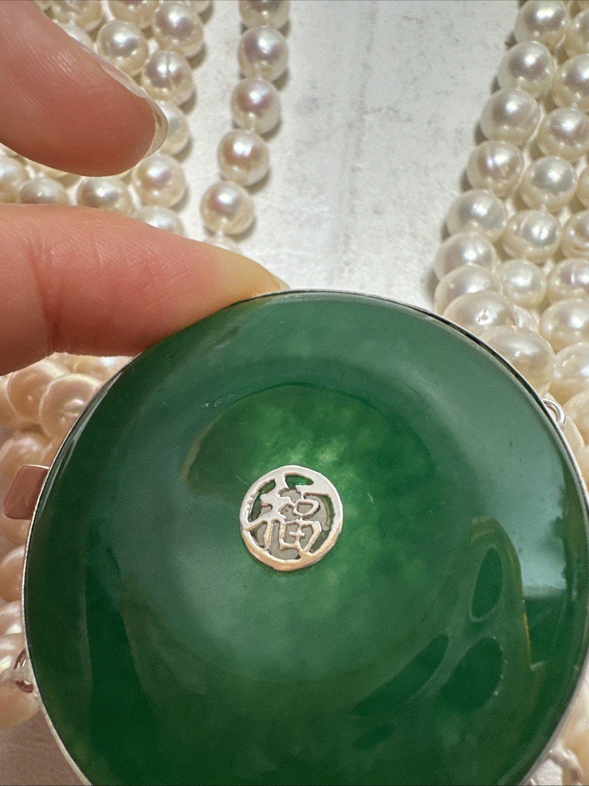 Chinese Natural Pearl Necklace, 925 Silver and a Green Stone In The Middle
