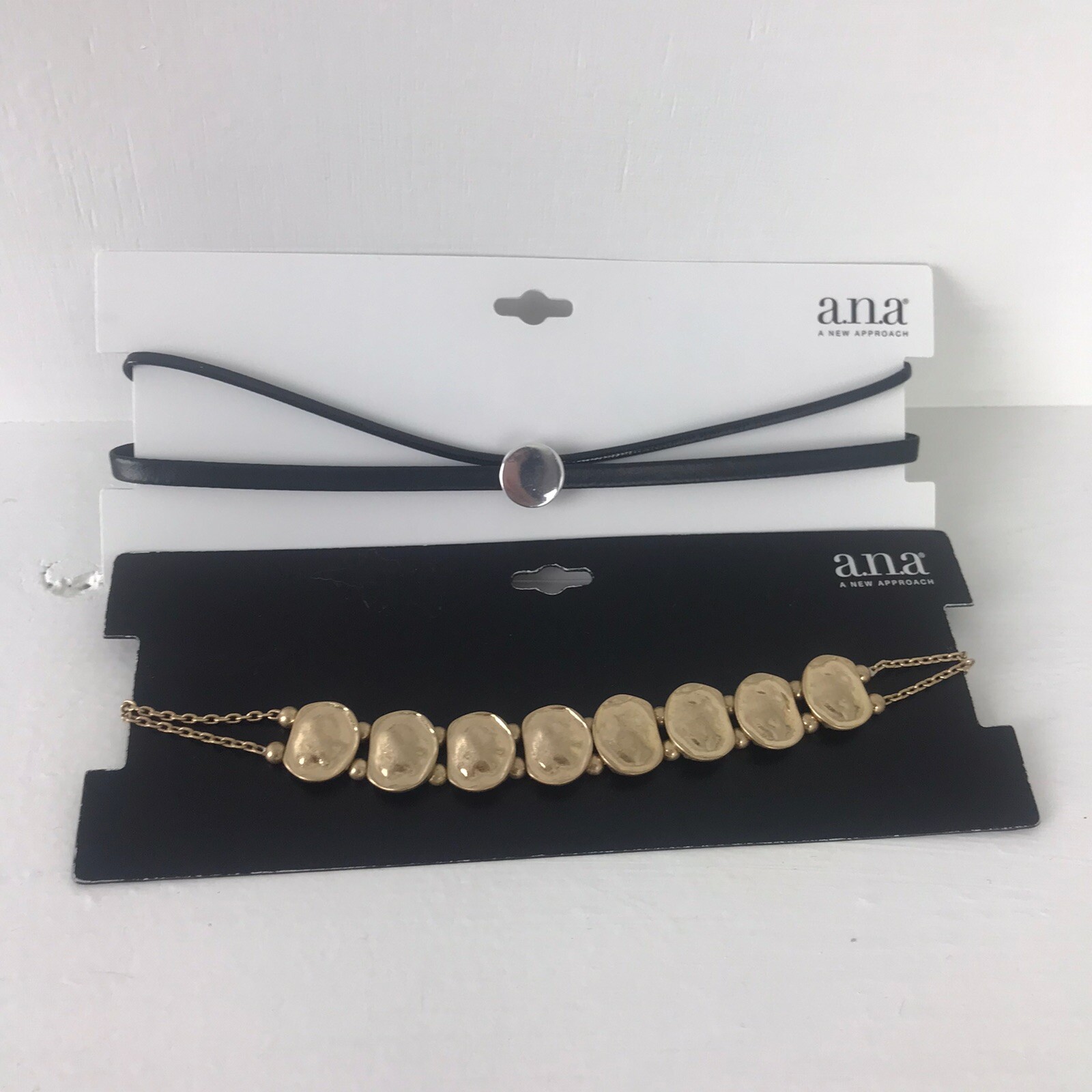a.n.a new approach Set Of 2 Chokers Gold Tone Dime Style. Black Cord Style