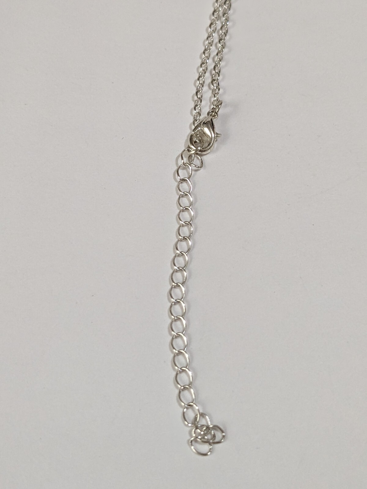 Intertwined Rhinestone Hearts Pendant Silver Tone Necklace. 18″. Modern.
