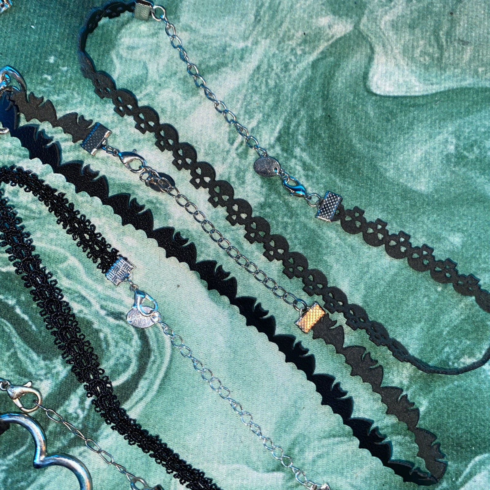 8 Chokers (4 lace-like, 2 string with pendants, 2 chains)