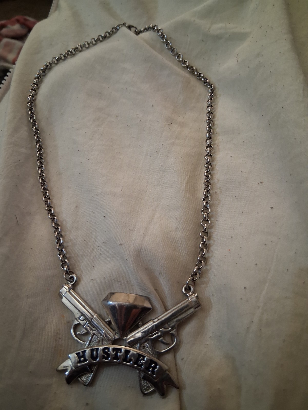 Silver Tone Cable Chain Necklace “HUSTLER” Pendant Charm w/ Crossed Pistols