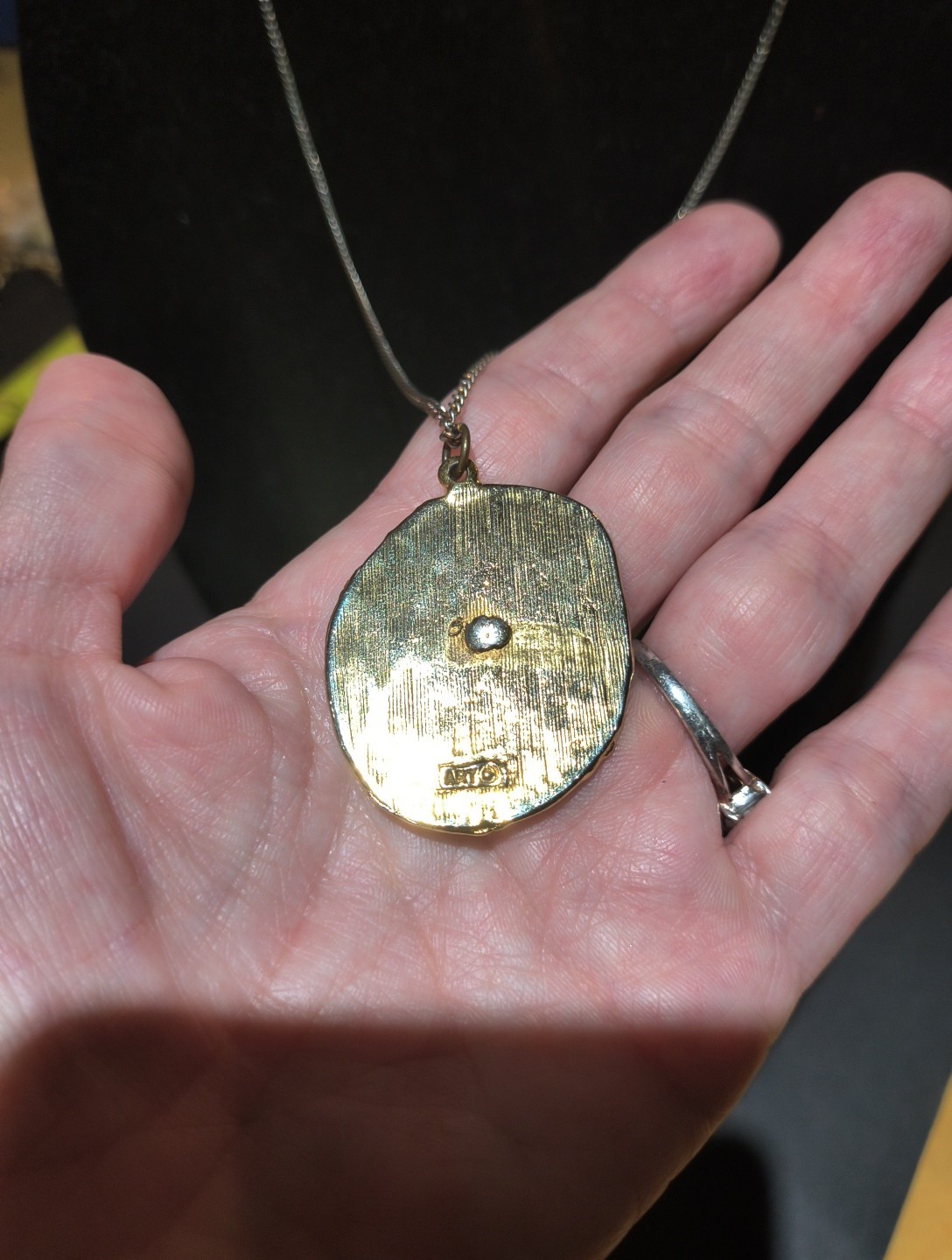 23 1/2 In Long Art Brand Necklace With Gold Tone Man With Vase Pendant