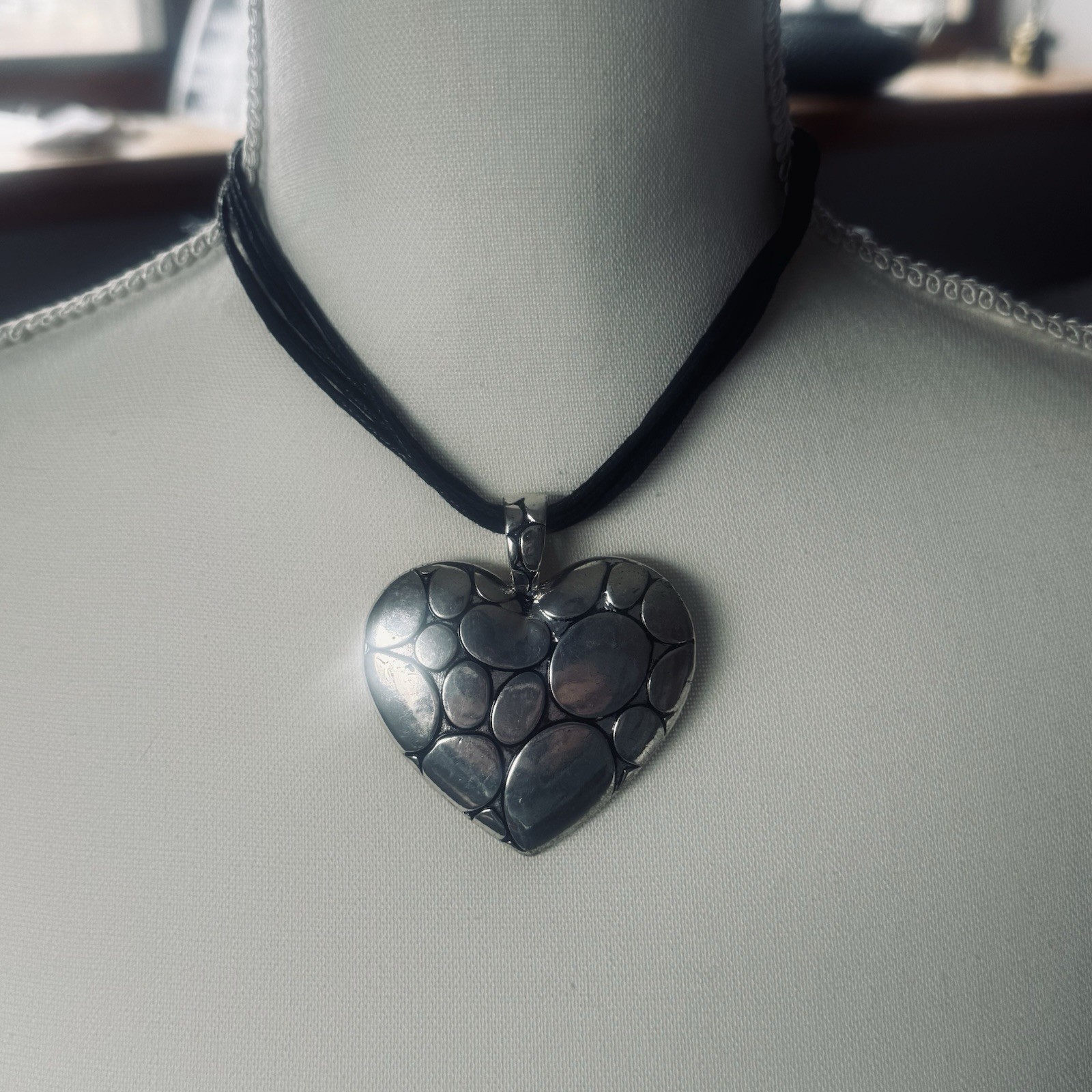 Modern silver tone pebbled heart pendant necklace on leather cording adjustable