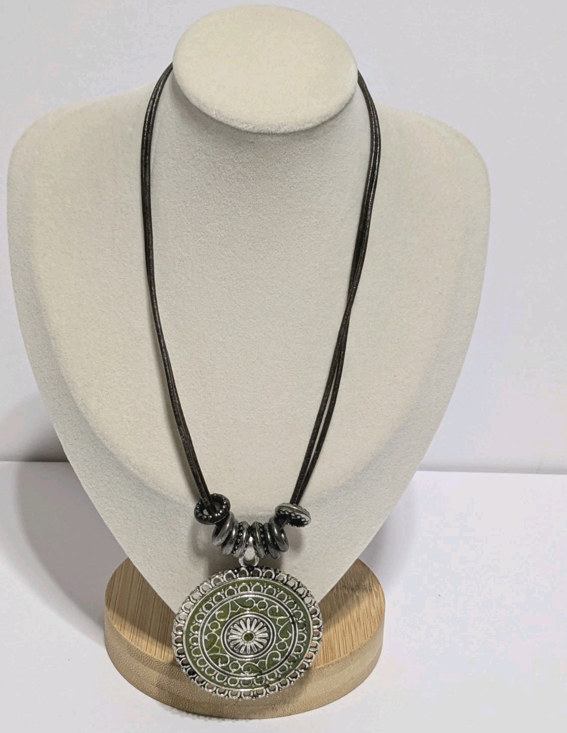 Faux Leather Brown Necklace With Silver Tone & Green Enamel Medallion Pendant