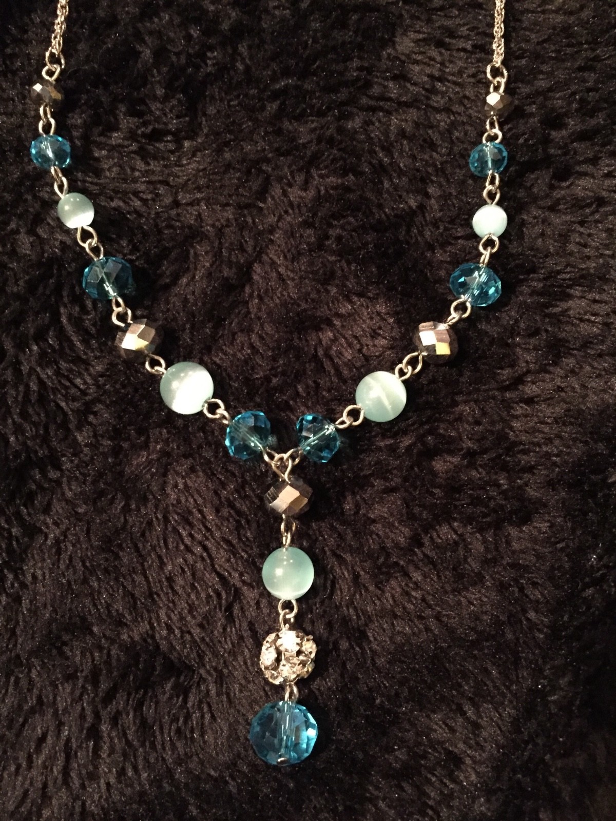 1928 Spring Faux Cat’s Eye Blue Dangle 16 inch adjustable Silvertone Chain
