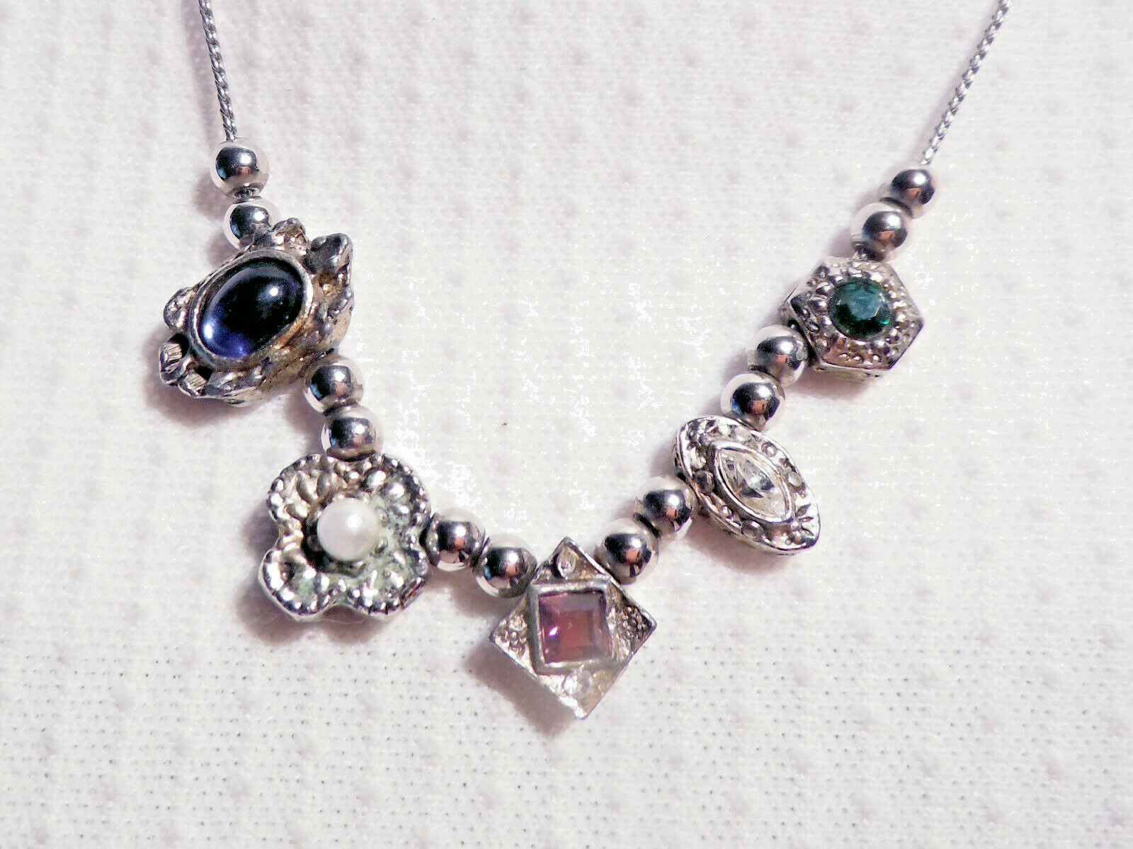 SILVER COLOR NECKLACE ~ VARIOUS COLORED STONES IN DIFFERENT SHAPES.