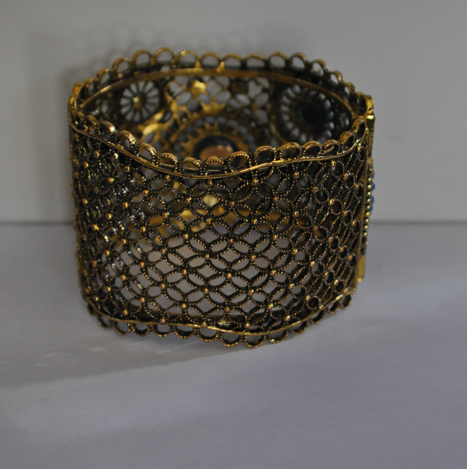 KIRKS FOLLY ROYAL BLUE CRYSTAL CUFF BRACELET IN ANTIQUE GOLD TONE