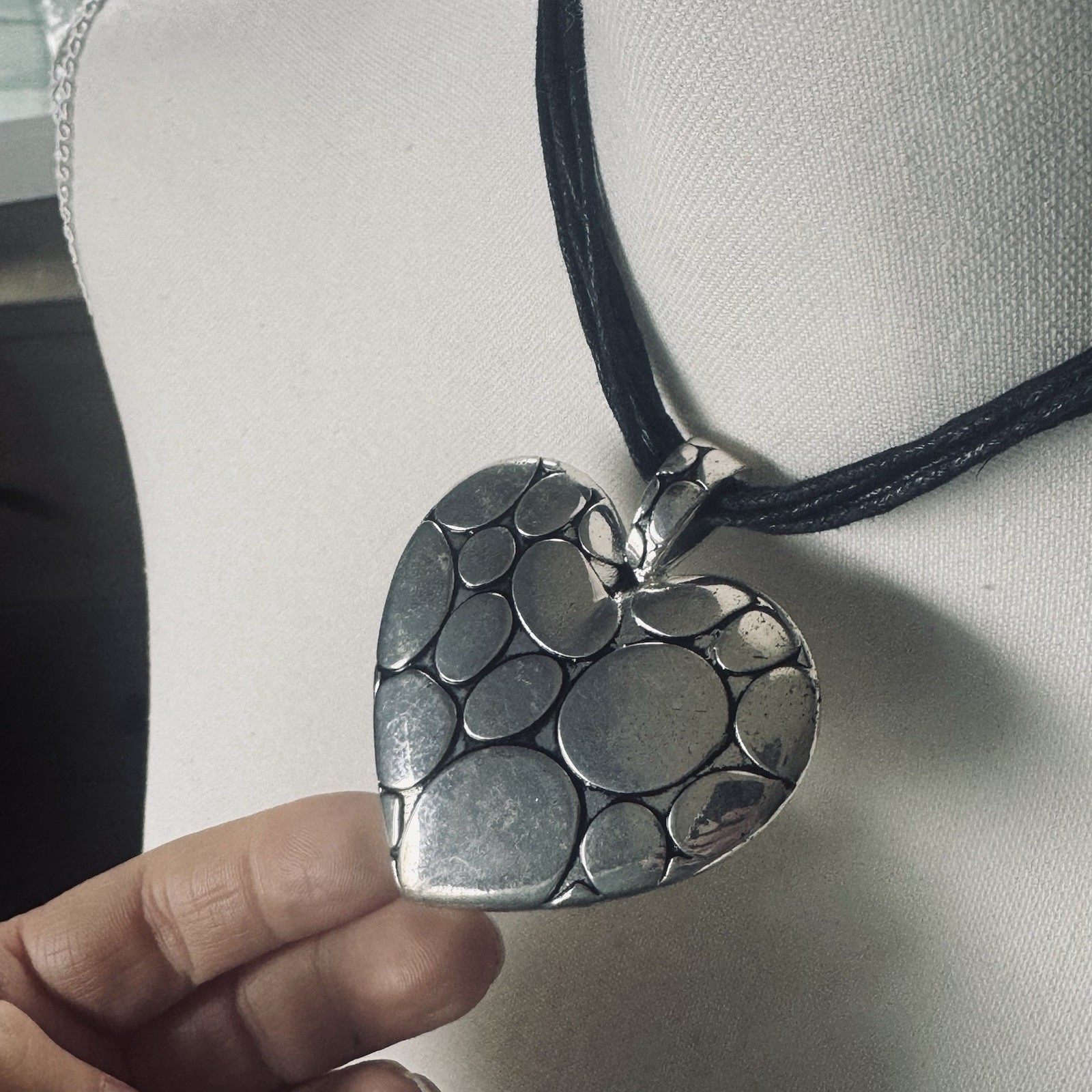 Modern silver tone pebbled heart pendant necklace on leather cording adjustable