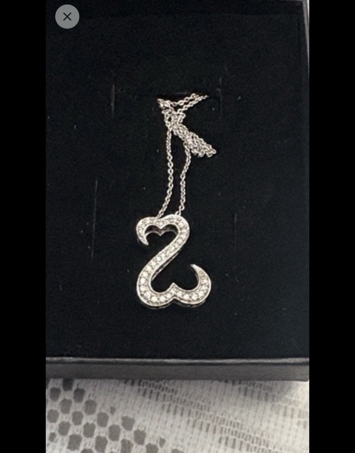 JAme Seymore open heart white gold chain and pendant 1/4 carat diamond